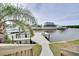 Private dock with boat lift offers direct access to the canal at 6530 Bimini Ct, Apollo Beach, FL 33572