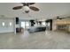 Open kitchen boasting modern cabinetry, large island, and tile flooring at 6530 Bimini Ct, Apollo Beach, FL 33572