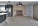 Living area features a brick fireplace and wood floors at 6530 Bimini Ct, Apollo Beach, FL 33572