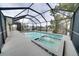 Enclosed pool and spa overlooking the canal at 6530 Bimini Ct, Apollo Beach, FL 33572