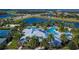 Community overview featuring a pool, clubhouse, and sports courts at 6645 Current Dr, Apollo Beach, FL 33572