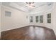 Primary bedroom with wood floors and bay window at 6645 Current Dr, Apollo Beach, FL 33572