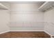 Spacious walk-in closet with wire shelving, providing ample storage space at 6645 Current Dr, Apollo Beach, FL 33572