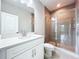 Modern bathroom with a glass shower and white vanity at 7773 93Rd N St # 31, Seminole, FL 33777