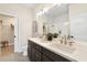 Double vanity bathroom with a walk-in shower and large closet at 7798 93Rd N St # 1, Seminole, FL 33777