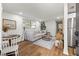 Open living space featuring a light gray sofa and wood-look flooring at 803 E North St, Tampa, FL 33604