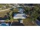 Aerial view of house back, detached shed, and a pool at 803 Innergary Pl, Valrico, FL 33594