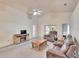 Bright living room with high ceilings and a cozy seating area at 803 Innergary Pl, Valrico, FL 33594