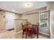 Small dining area with table and chairs, near entryway at 832 13Th N Ave, St Petersburg, FL 33701