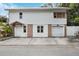 Two-story house with attached garage and small front yard at 832 13Th N Ave, St Petersburg, FL 33701