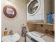 Compact laundry room with washer, dryer, and small sink at 832 13Th N Ave, St Petersburg, FL 33701