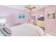 Bright bedroom with a comfy bed and relaxing coastal decor at 90 S Highland Ave # 7, Tarpon Springs, FL 34689