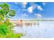 Scenic lake view with a community dock at 90 S Highland Ave # 7, Tarpon Springs, FL 34689