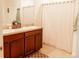 Double vanity bathroom with shower/tub combo at 10029 Warm Stone St, Thonotosassa, FL 33592