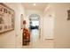 Inviting entryway, featuring decorative art and wood flooring at 10029 Warm Stone St, Thonotosassa, FL 33592