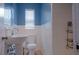 Simple bathroom with white tile and pedestal sink at 1018 E Hanna Ave, Tampa, FL 33604