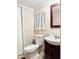 Simple bathroom with a toilet and sink at 10538 Bay Hills Cir, Thonotosassa, FL 33592