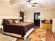 Large main bedroom with king-size bed and ceiling fan at 10538 Bay Hills Cir, Thonotosassa, FL 33592