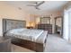 Main bedroom with king-size bed and plenty of natural light at 1080 Buena Vista Ave, Brooksville, FL 34601