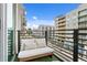 Outdoor balcony with seating and city views at 1120 E Kennedy Blvd # 413, Tampa, FL 33602