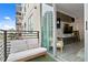 Spacious balcony with seating and city views at 1120 E Kennedy Blvd # 413, Tampa, FL 33602