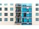 Modern building with balconies and large windows at 1120 E Kennedy Blvd # 413, Tampa, FL 33602