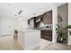 Modern kitchen with stainless steel appliances and an island at 1120 E Kennedy Blvd # 413, Tampa, FL 33602