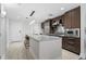 Modern kitchen with stainless steel appliances and an island at 1120 E Kennedy Blvd # 413, Tampa, FL 33602