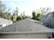 Dark gray architectural shingles on the house roof at 11719 Mango Groves Blvd, Seffner, FL 33584