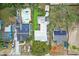 High-angle view of houses with pools and solar panels at 1217 E Flora St, Tampa, FL 33604