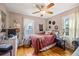 Charming bedroom with a full bed and rustic decor at 1217 E Flora St, Tampa, FL 33604