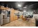 Modern kitchen with light wood cabinets and an island at 1217 E Flora St, Tampa, FL 33604