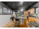 Modern kitchen features a large island and dark painted ceiling at 1217 E Flora St, Tampa, FL 33604