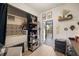 Functional laundry room with built-in storage and backyard access at 1217 E Flora St, Tampa, FL 33604