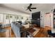 Bright living room featuring a fireplace and large windows at 1217 E Flora St, Tampa, FL 33604