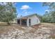 House exterior showcasing a freshly painted exterior and landscaping at 12240 Eakin St, Weeki Wachee, FL 34614