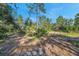 Wooded lot with sand and pine trees at 12240 Eakin St, Weeki Wachee, FL 34614