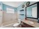 Updated bathroom with granite vanity and tub at 13000 Club Dr, Hudson, FL 34667