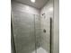 Large walk-in shower with glass enclosure and tile surround at 13299 Ogden Glade Rd, Dade City, FL 33525