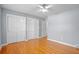 Bright bedroom with hardwood floors and ample closet space at 1338 Whitacre Dr, Clearwater, FL 33764