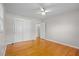 Well-lit bedroom, hardwood floors, and built-in closet at 1338 Whitacre Dr, Clearwater, FL 33764