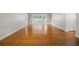 Bright living room featuring gleaming hardwood floors at 1338 Whitacre Dr, Clearwater, FL 33764