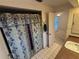 Bathroom with shower and access to bedroom at 13986 Bonnie Brae Dr, Largo, FL 33774