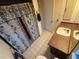 Bathroom with shower, vanity, and tiled floor at 13986 Bonnie Brae Dr, Largo, FL 33774