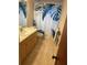 Updated bathroom with wood vanity and shower at 13986 Bonnie Brae Dr, Largo, FL 33774