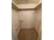 Large bedroom closet with hanging rod and shelving at 13986 Bonnie Brae Dr, Largo, FL 33774