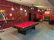 Game room with a pool table and bar with a shark theme at 13986 Bonnie Brae Dr, Largo, FL 33774