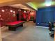 Game room with a pool table, fireplace, and bar area at 13986 Bonnie Brae Dr, Largo, FL 33774