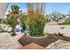 Landscaped backyard with firepit and seating at 1437 Park St, Clearwater, FL 33755