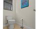 Small bathroom with toilet and modern decor at 1575 N River Cir, Tarpon Springs, FL 34689